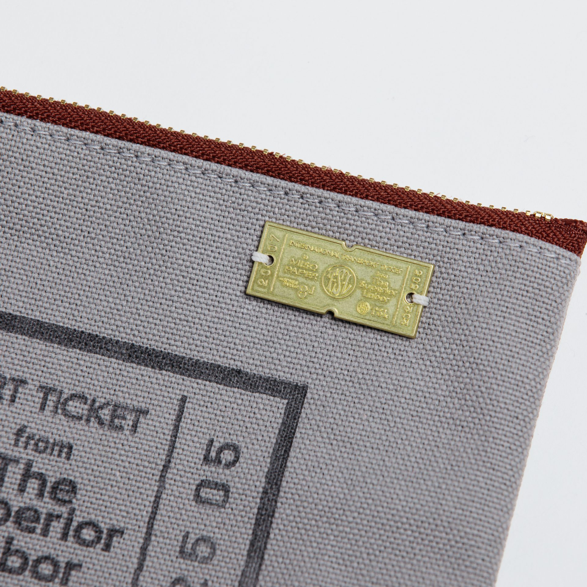 Miso Paper x TSL Limited Edition Canvas Pouch - Ticket brass plate detail