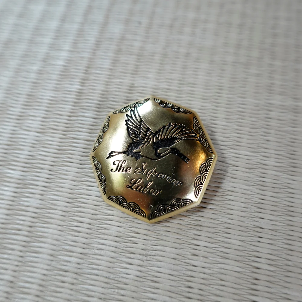 The Superior Labor Crane Brass Charm