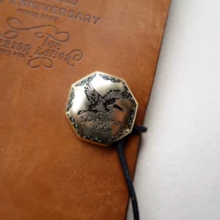 The Superior Labor Crane Brass Charm