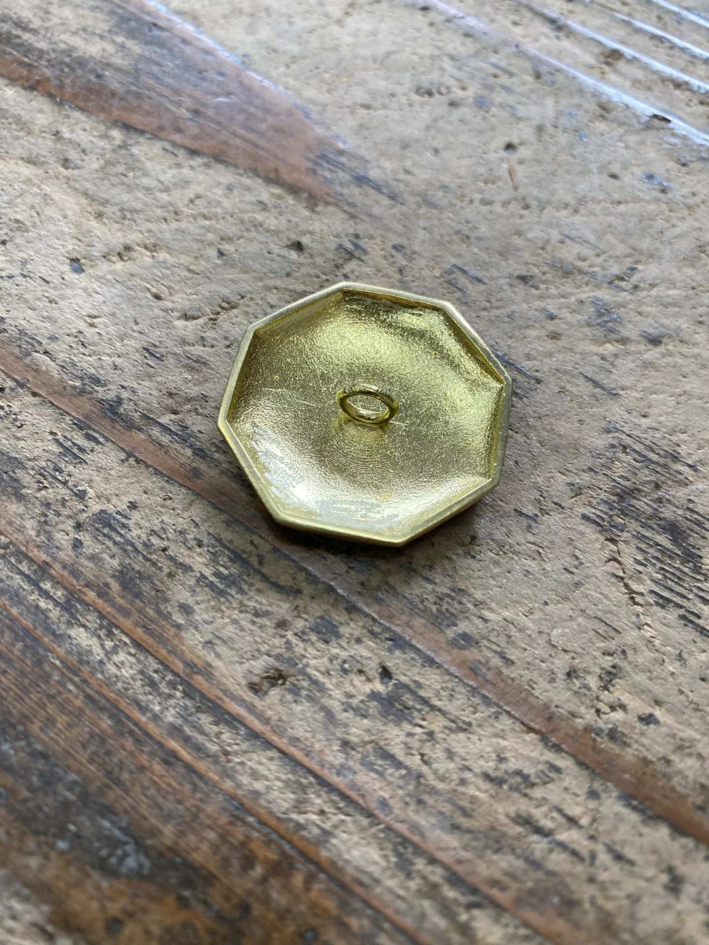 The Superior Labor Crane Brass Charm