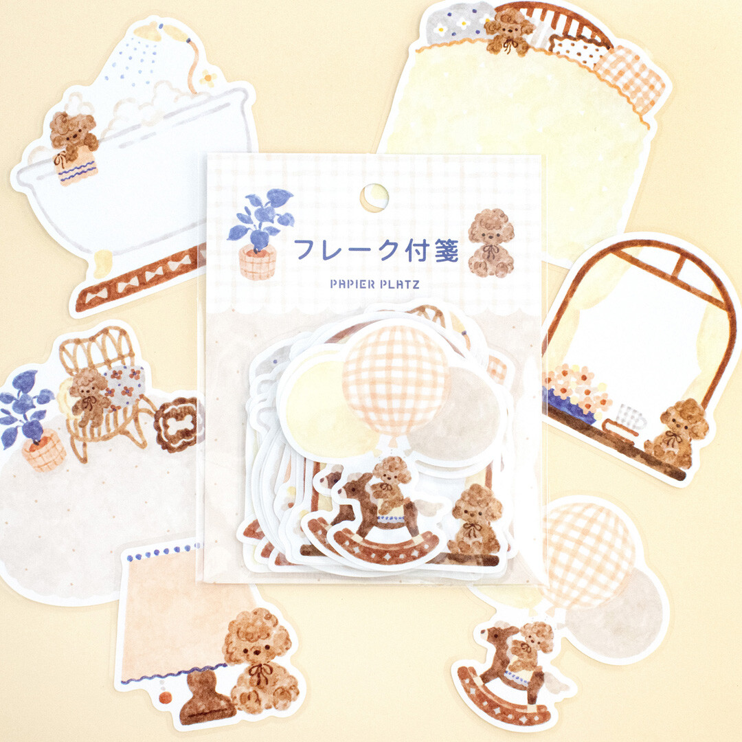 : Individual Papier Platz teddy bear stickers by Nakauchiwaka featuring beds, lamps, bathtubs, mirrors, and rocking horse illustrations on a yellow background.