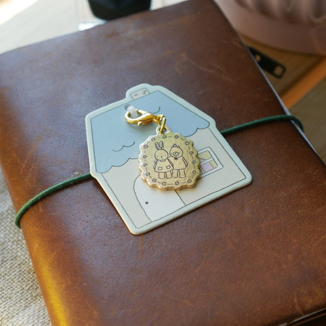 Dana Ate Oatmeal Brass Charm – Always by Your Side
