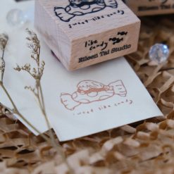 Pair of Sweet Like Candy rubber stamps by Eileen Tai Studio styled on a textured background.