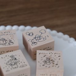 Wooden rubber stamp showing a cloudy day illustration from the Let’s Play weather stamp collection