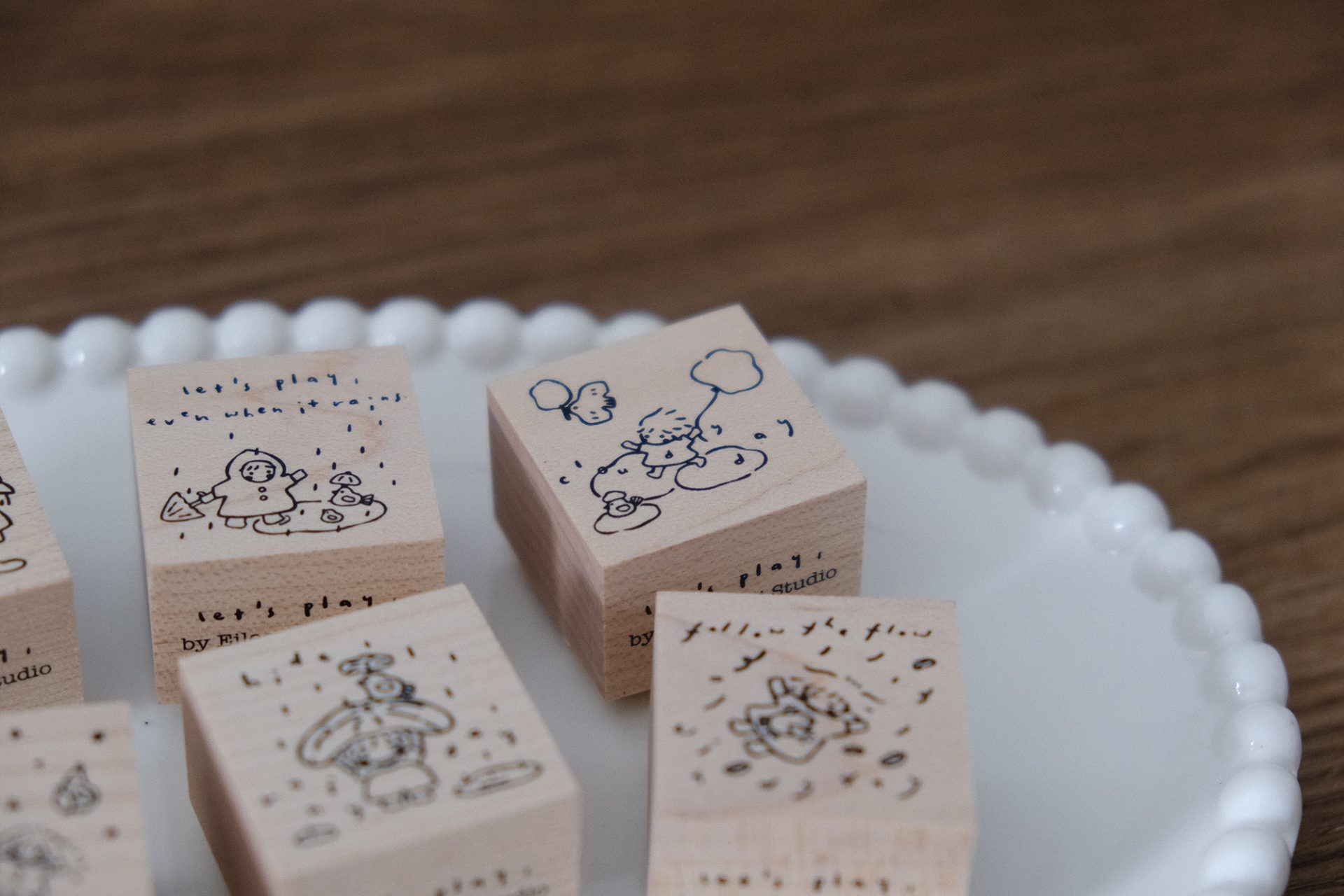 Wooden rubber stamp showing a cloudy day illustration from the Let’s Play weather stamp collection