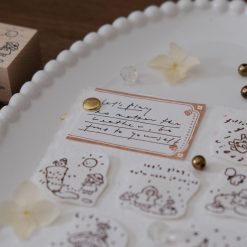 Weather-themed wooden stamps from the Let’s Play collection used in a journaling setup.