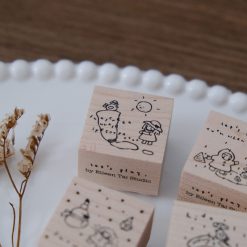 Wooden stamp featuring a sunny day illustration from the Let’s Play collection.