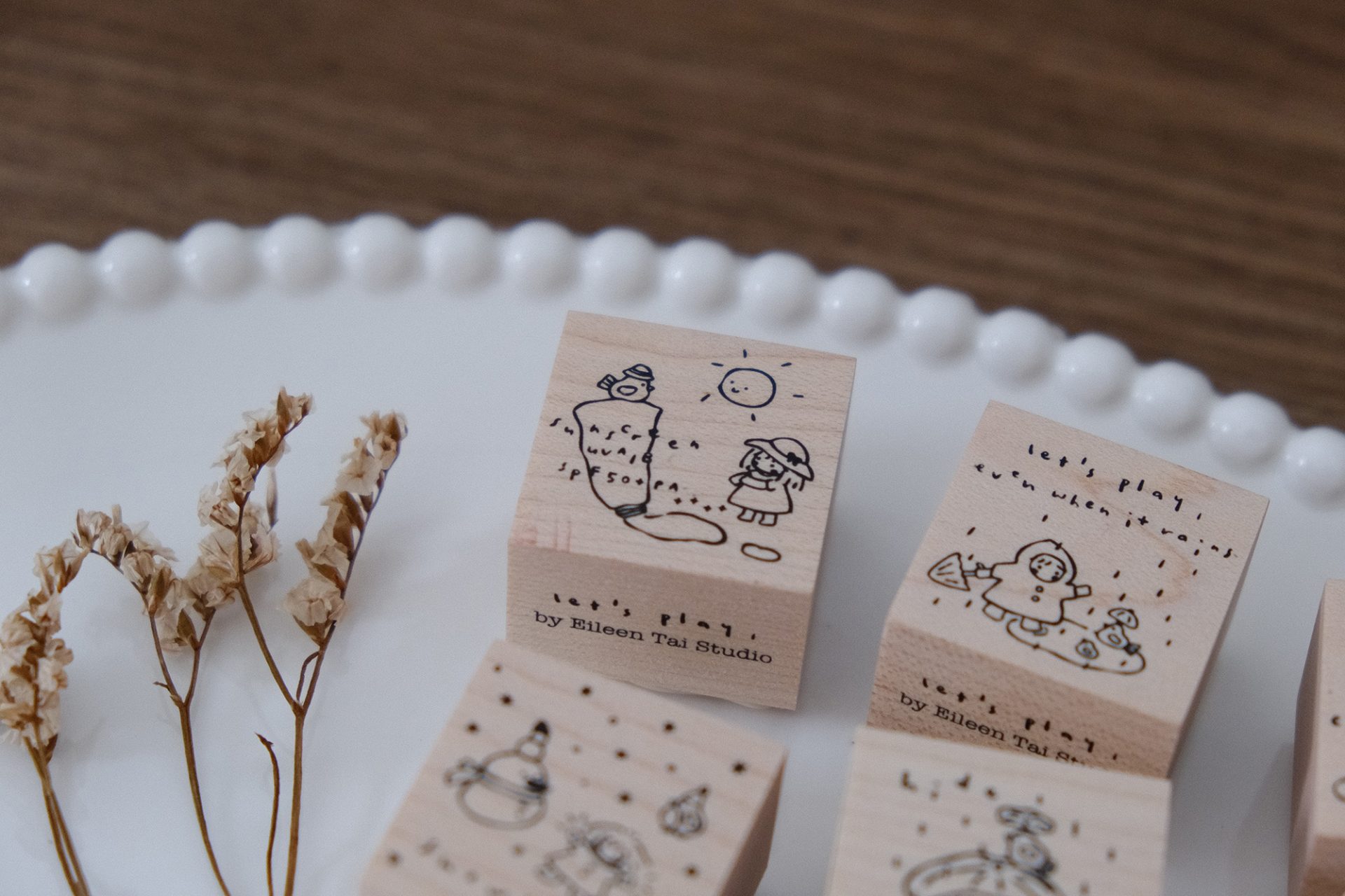 Wooden stamp featuring a sunny day illustration from the Let’s Play collection.