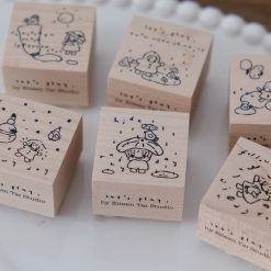 Wooden weather-themed rubber stamp set from the Let’s Play collection by Eileen Tai Studio.