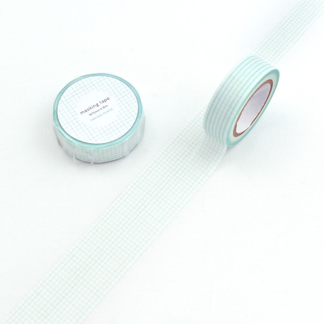 Aquamarine green Papier Platz grid masking tape roll unrolled to show fine grid pattern